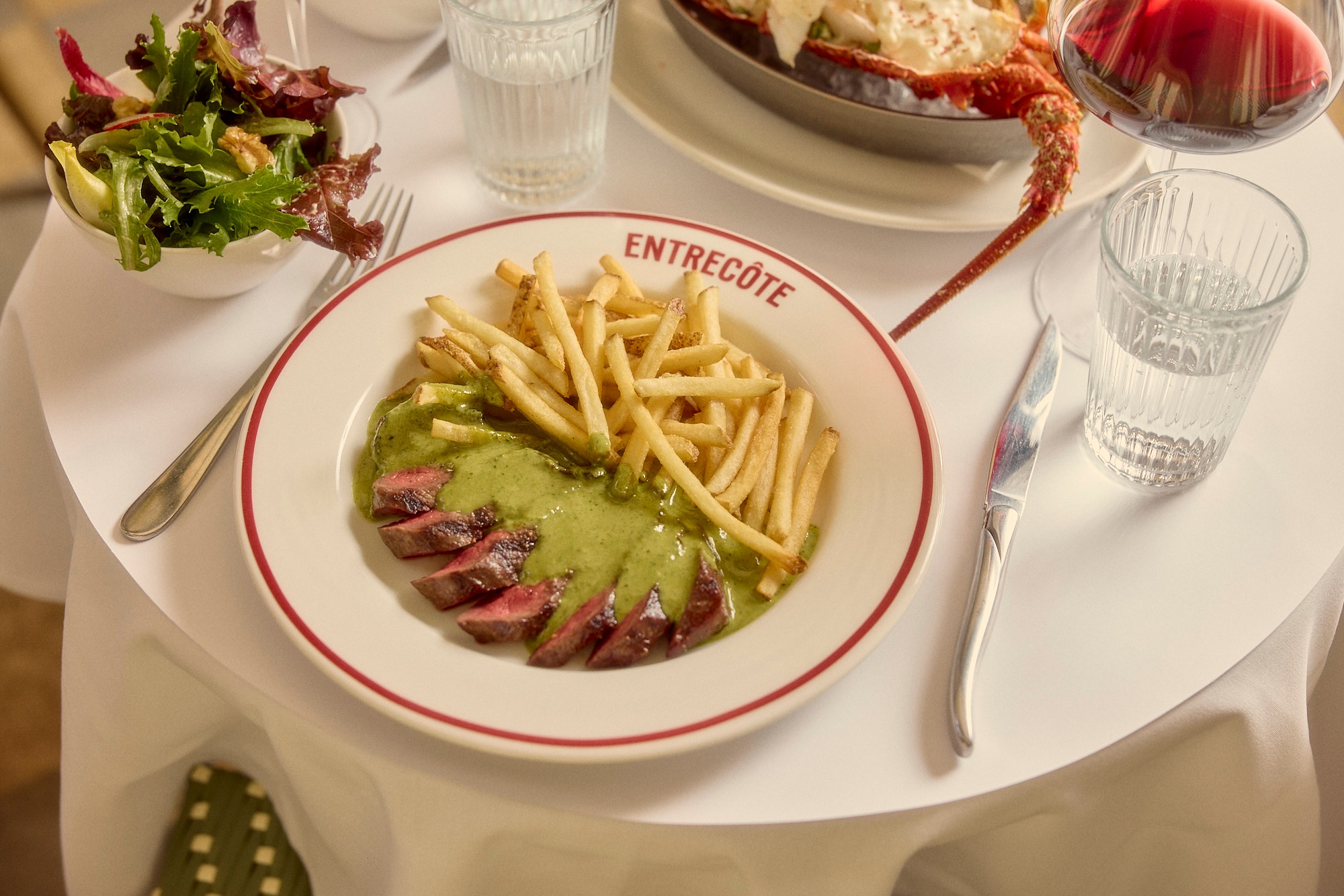Steak frites on plate at Entrecote, Prahran restaurant